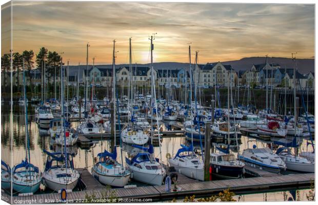 Sunsets on Inverkip Marina Canvas Print by RJW Images