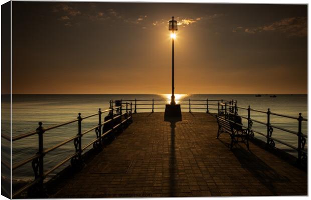 Banjo Jetty in Swanage Canvas Print by Ian Middleton