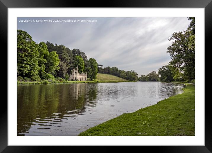 Vineyard and old ruin on the banks of Painshill Park lake Framed Mounted Print by Kevin White
