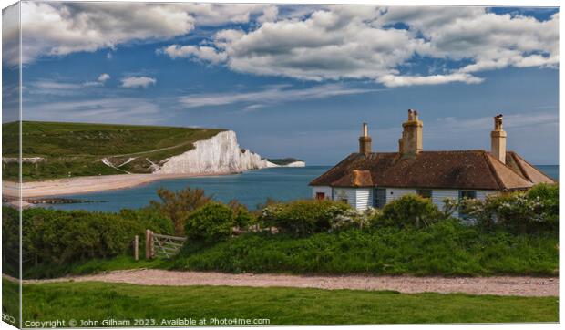Seven Sisters and The Coastguards Cottage at Cuckm Canvas Print by John Gilham
