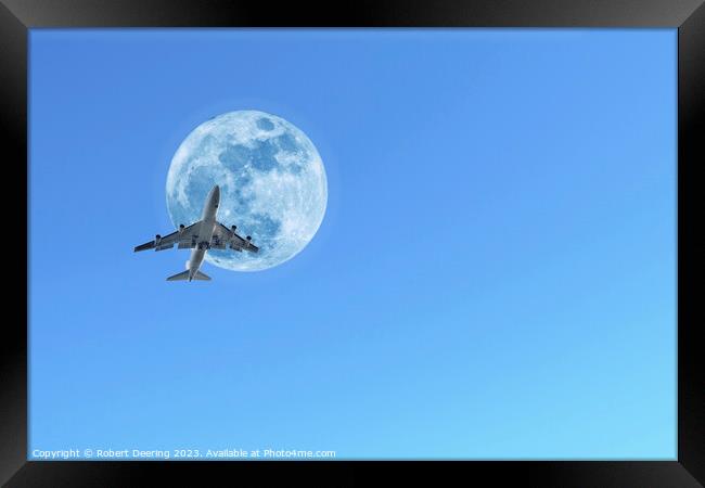 Jumbo Jet and Moon Framed Print by Robert Deering