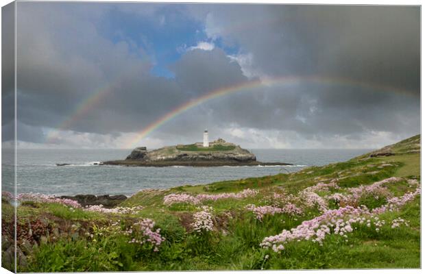 Godrevy lighthouse with a rainbow Canvas Print by kathy white