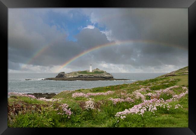 Godrevy lighthouse with a rainbow Framed Print by kathy white