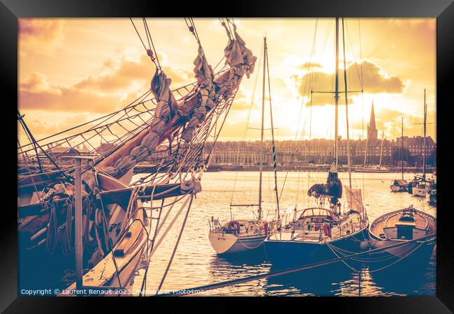 Old corsair ship and boats in Saint Malo at sunset, also known a Framed Print by Laurent Renault