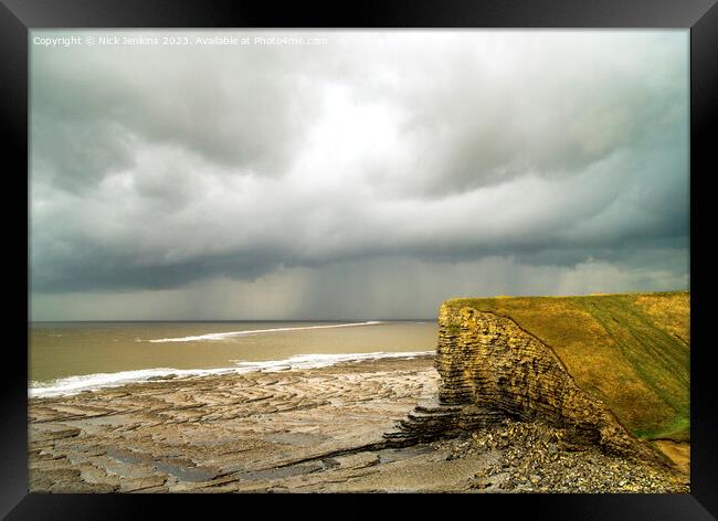 A stormy sky over Nash Point Glamorgan Heritage Coast Framed Print by Nick Jenkins