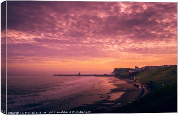 Tranquil Sunrise Over Whitby Canvas Print by Michael Shannon
