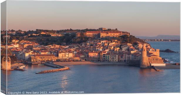 Alpenglow light in Collioure, France Canvas Print by Pere Sanz