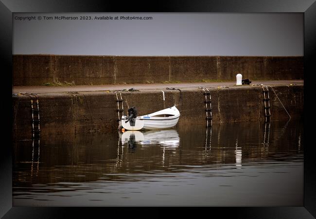 Serene solitude in Hopeman harbour Framed Print by Tom McPherson