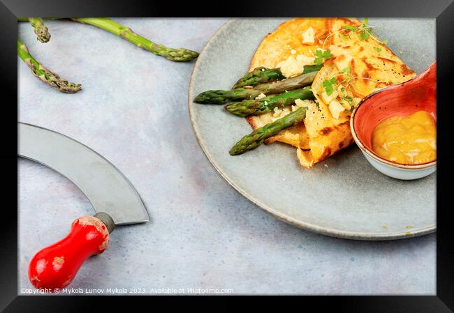 Omelet with fresh asparagus and sauce. Framed Print by Mykola Lunov Mykola