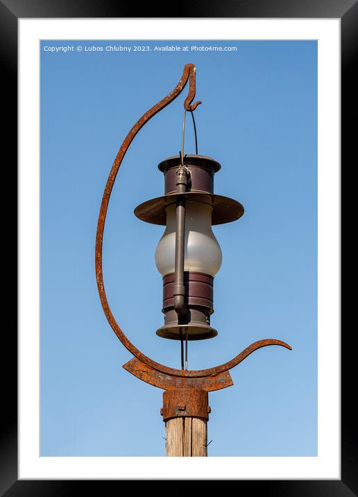 Outdoor lighting in the shape of a kerosene lamp Framed Mounted Print by Lubos Chlubny