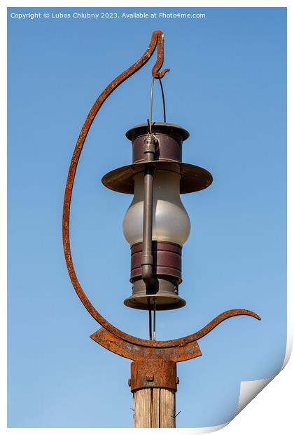 Outdoor lighting in the shape of a kerosene lamp Print by Lubos Chlubny