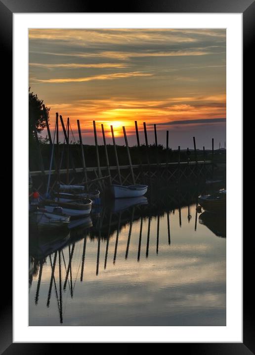 Sunset reflections over Blakeney Quay Norfolk  Framed Mounted Print by Tony lopez