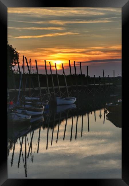 Sunset reflections over Blakeney Quay Norfolk  Framed Print by Tony lopez