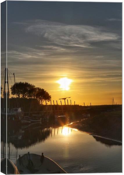 Sunset colours over Blakeney Quay in reflection  Canvas Print by Tony lopez