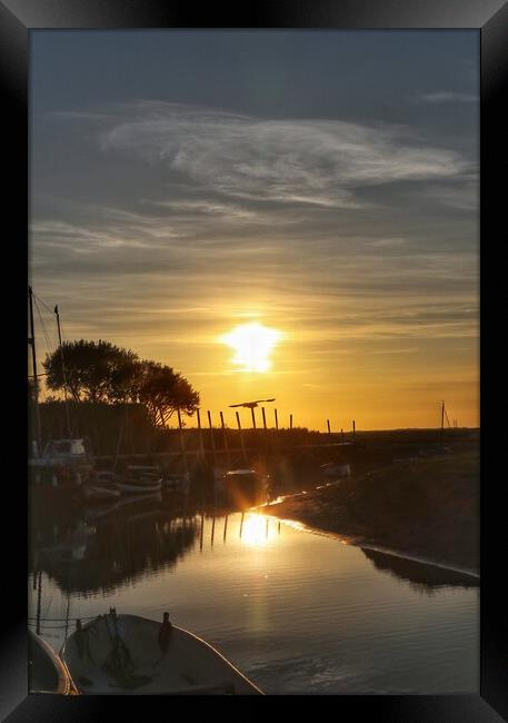 Sunset colours over Blakeney Quay in reflection  Framed Print by Tony lopez