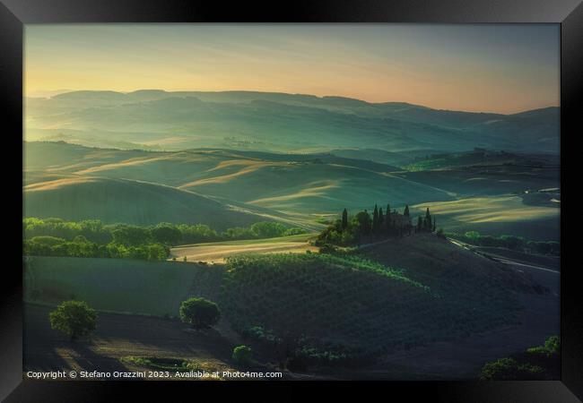 The landscape of the Val d'Orcia at dawn. Tuscany Framed Print by Stefano Orazzini