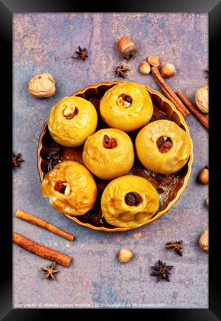 Baked autumn apples with nuts and raisins Framed Print by Mykola Lunov Mykola