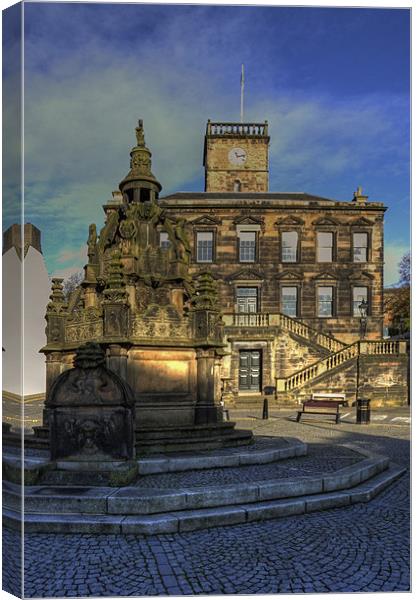 Town House and Well Canvas Print by Tom Gomez