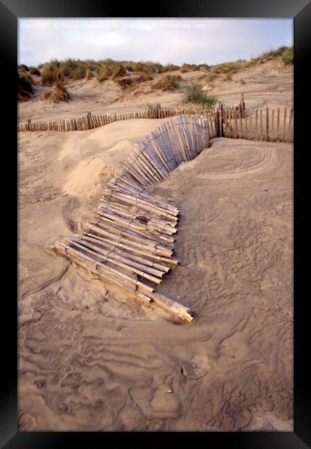 Captivating Broken Fence on Camber Sands Framed Print by Derek Daniel
