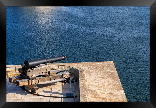 Saluting Battery Gun Facing The Sea In Malta Framed Print by Artur Bogacki