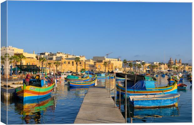 Boats in Marsaxlokk Fishing Village Port in Malta Canvas Print by Artur Bogacki