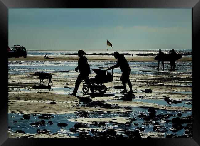 Family at the Sea side  Framed Print by Dave Bell