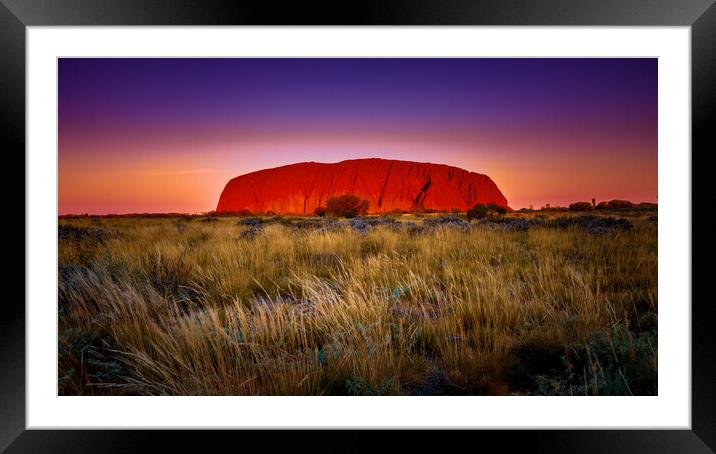 Fiery Skies over Uluru Framed Mounted Print by John Frid
