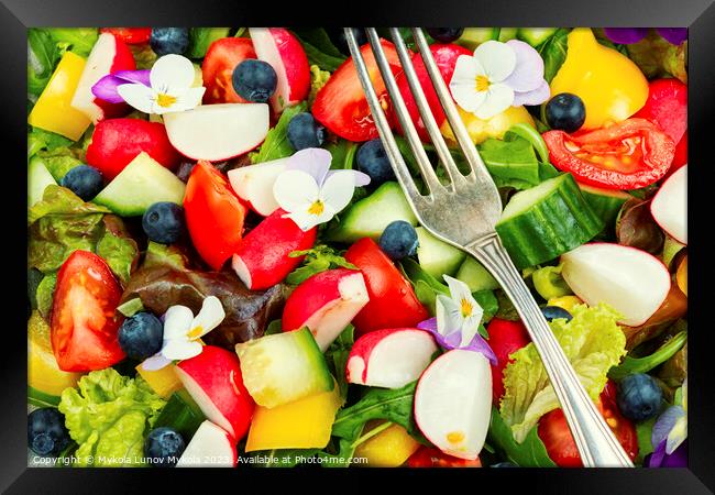 Tasty light salad with edible flowers Framed Print by Mykola Lunov Mykola