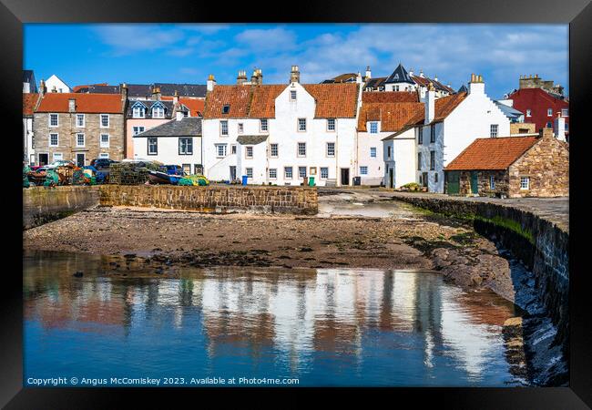 Whitewashed stone houses on Pittenweem harbour Framed Print by Angus McComiskey