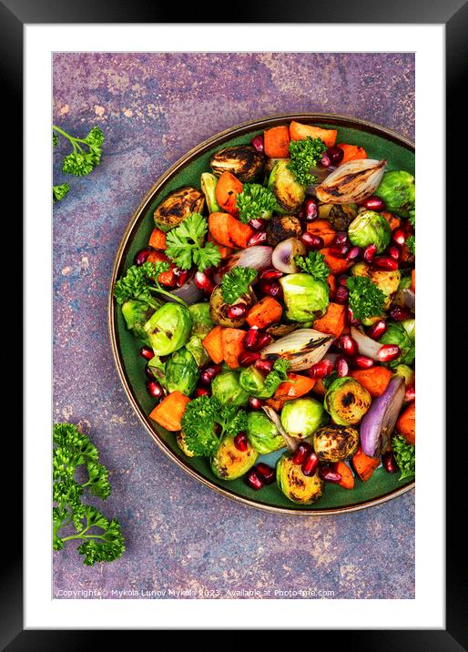 Bright vegetable salad on the table. Framed Mounted Print by Mykola Lunov Mykola