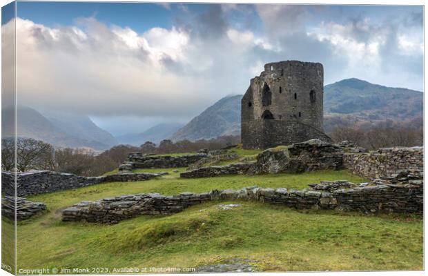 Dolbadarn Castle ruins overlooking Padarn Lake Canvas Print by Jim Monk