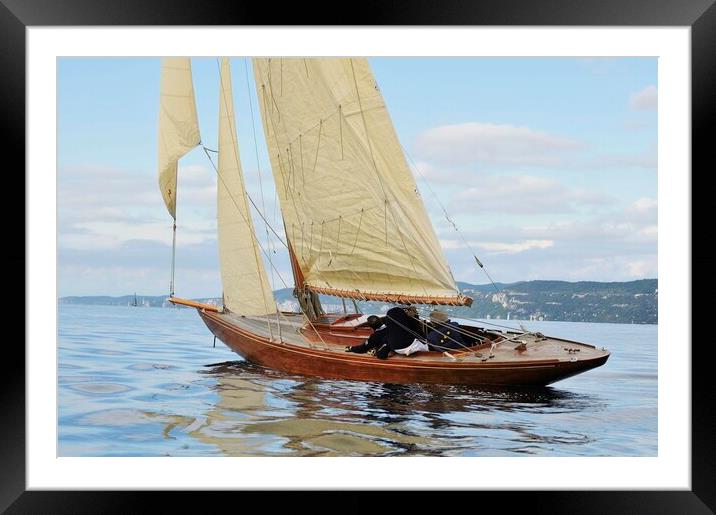 Wooden sailboat Framed Mounted Print by Massimiliano Leban