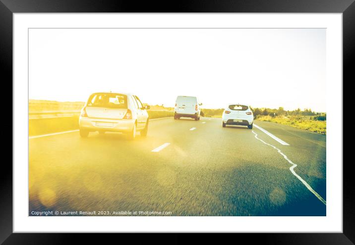 On blur traffic road with colorful bokeh light abstract. Real tr Framed Mounted Print by Laurent Renault