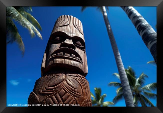 Tiki sculpture engraved in the wood Hawaiian religious motifs. A Framed Print by Joaquin Corbalan