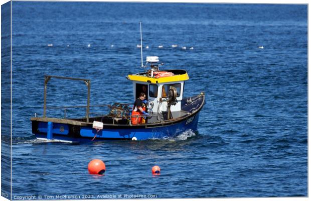 Outdoor lobster fisherman at work Canvas Print by Tom McPherson