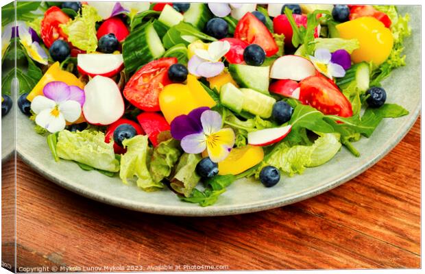 Tasty summer salad with edible flowers Canvas Print by Mykola Lunov Mykola