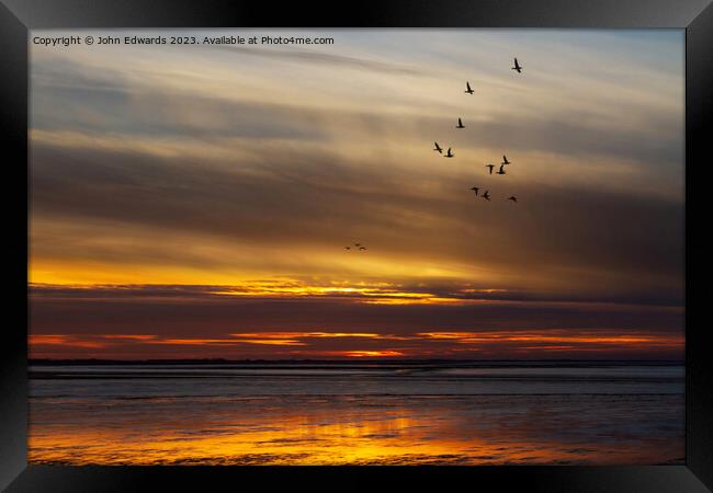 Pink-footed Geese Migration at Norfolk Sunset Framed Print by John Edwards
