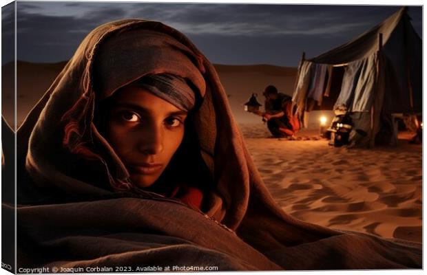 A turbaned Tuareg at night in the desert. Ai generated. Canvas Print by Joaquin Corbalan