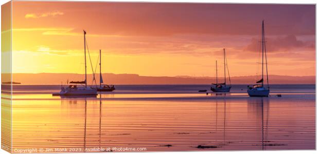 Serene Dawn at Lamlash Bay Canvas Print by Jim Monk