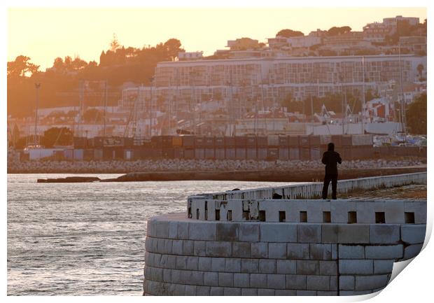 Silhouette of a man standing at the coast of Lisbon Print by Lensw0rld 
