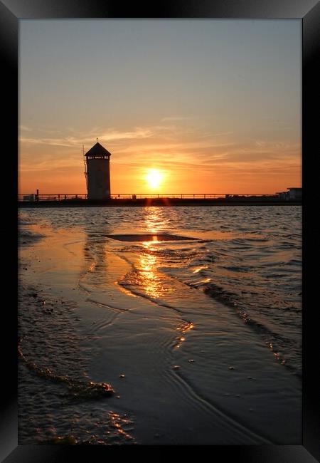 Sunsetting over the tidal pool in Brightlingsea  Framed Print by Tony lopez