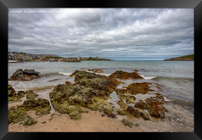 Rocky Beach at Cemaes Bay, Anglesey Framed Print by Derek Daniel