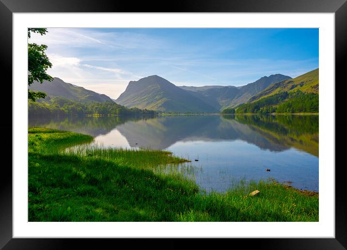 View across the lake Framed Mounted Print by Michael Brookes