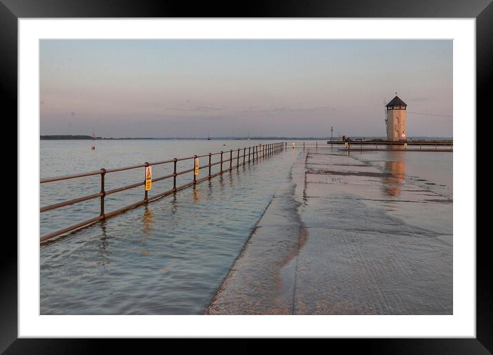 Batemans tower Brightlingsea as the tide comes in  Framed Mounted Print by Tony lopez