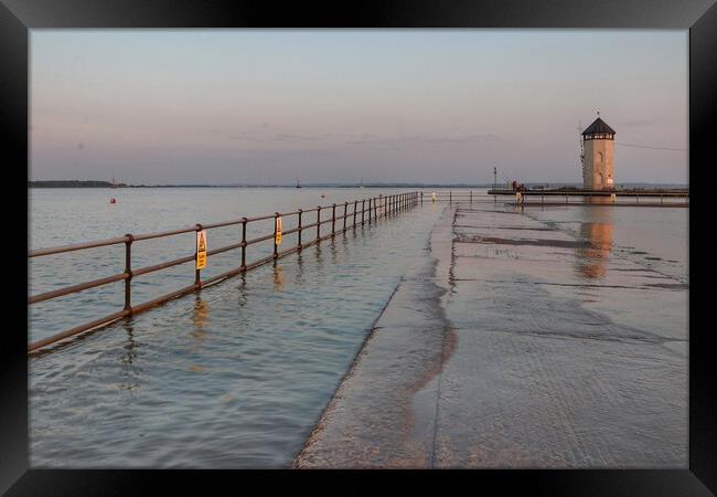 Batemans tower Brightlingsea as the tide comes in  Framed Print by Tony lopez