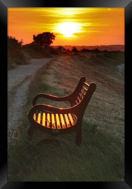 Best seat in the house at sunset in Brightlingsea  Framed Print by Tony lopez