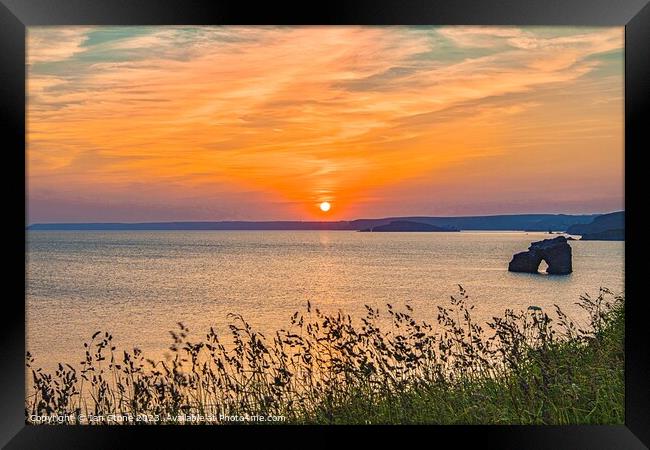 A stunning Devon sunset  Framed Print by Ian Stone