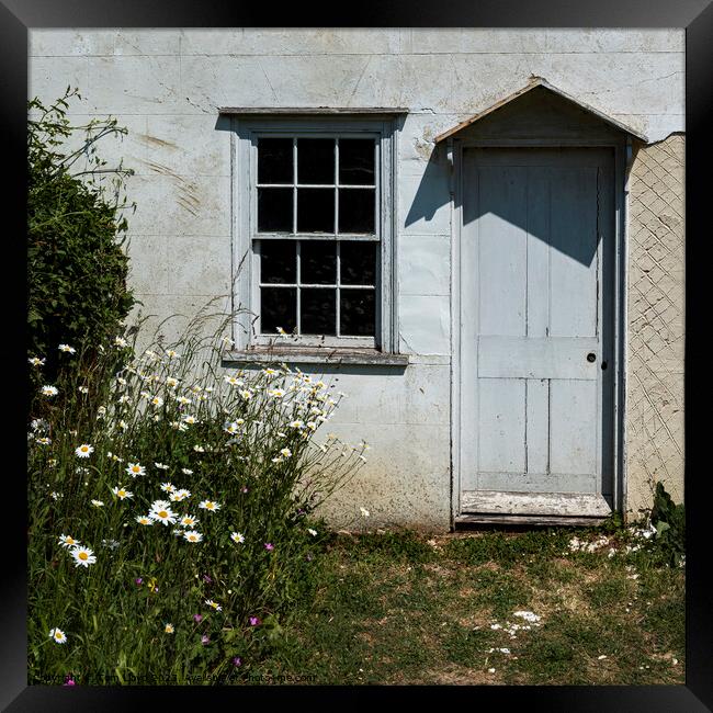 Building doorwindows Framed Print by Tom Lloyd