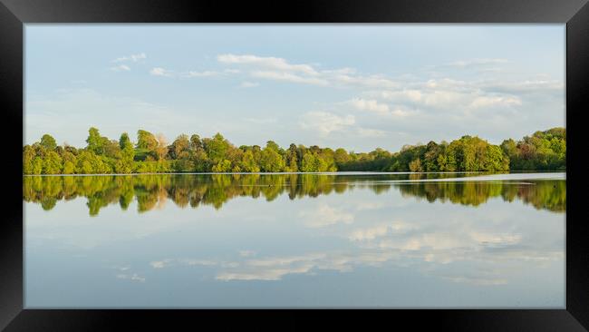 View across the Mere to a clear reflection of dist Framed Print by Steve Heap