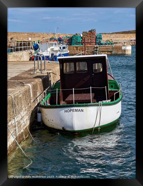 Lone boat at Hopeman Harbour Framed Print by Tom McPherson